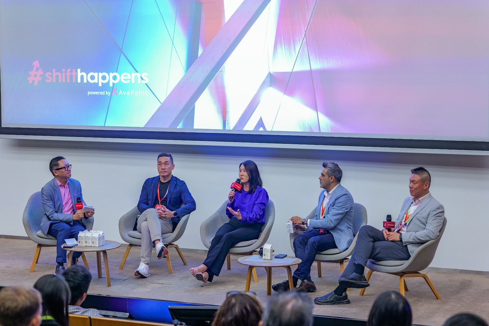 Dux seated at the far left of a five-person panel